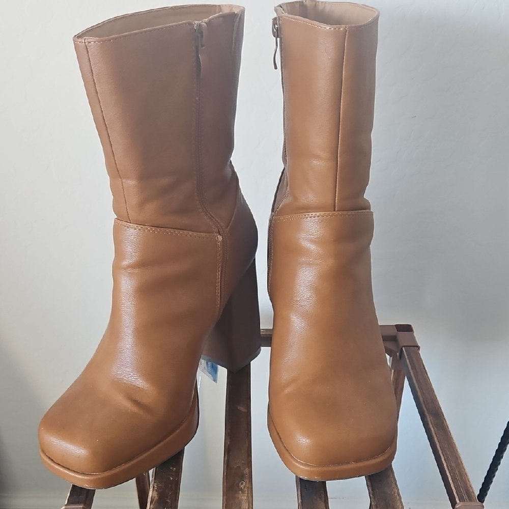 Torrid Brown Heeled Boots with Platform and Mid-Calf Style